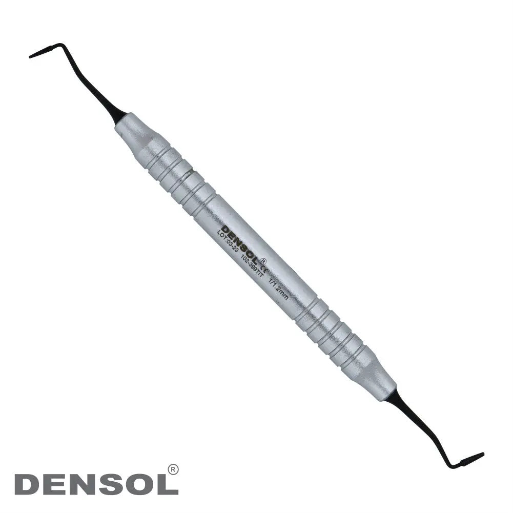 Dental Restorative Mortonson 1/1.2mm TIT Black plugger with silver handle and black tips, used for packing filling materials in dental procedures. Densol brand dental instrument on white background.