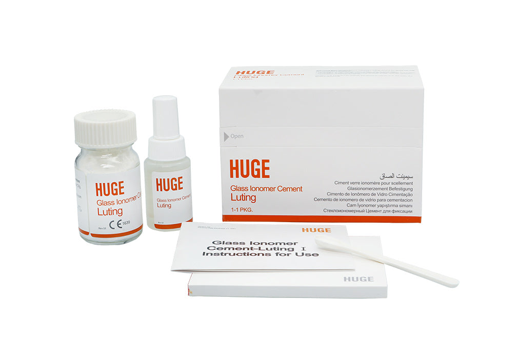 Glass Ionomer Cement Luting I kit containing powder bottle, liquid dropper, mixing pad and measuring scoop in white packaging with orange product labeling for dental crown and bridge cementation procedures