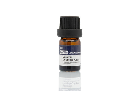 A 5ml amber glass bottle of TopCEM-Ceramic Primer Ceramic Coupling Agent with black cap, featuring professional dental ceramic bonding solution for restorative interfaces, displayed against white background with reflection