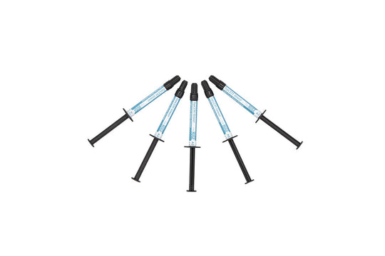 Five TopCEM-Veneer Light Cure Veneer Cement syringes arranged in a fan pattern displaying clear barrels with blue product and black dispensing tips for dental veneer application