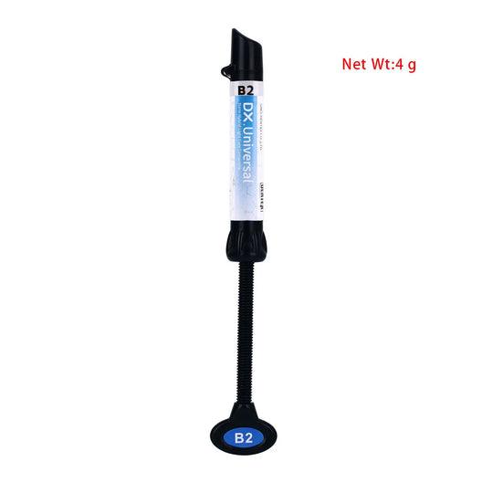 Dental Universal Nano Hybrid Light Cure Composite Resin 4g syringe in B2 shade, with blue label and black applicator tip. Product image shows net weight of 4g.