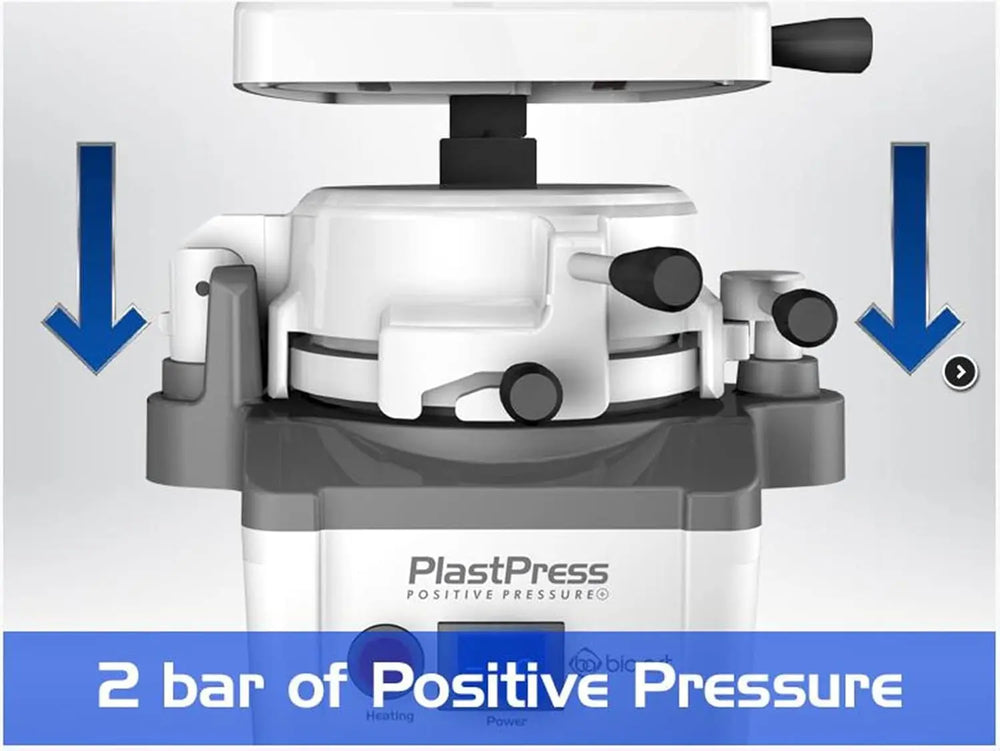 BIOART Dental Positive Pressure PlastPress Vacuum Forming Machine Laboratory Heat Molding Equipment with 2 bar of positive pressure, featuring compact white design and blue pressure indicators for dental laboratory use.