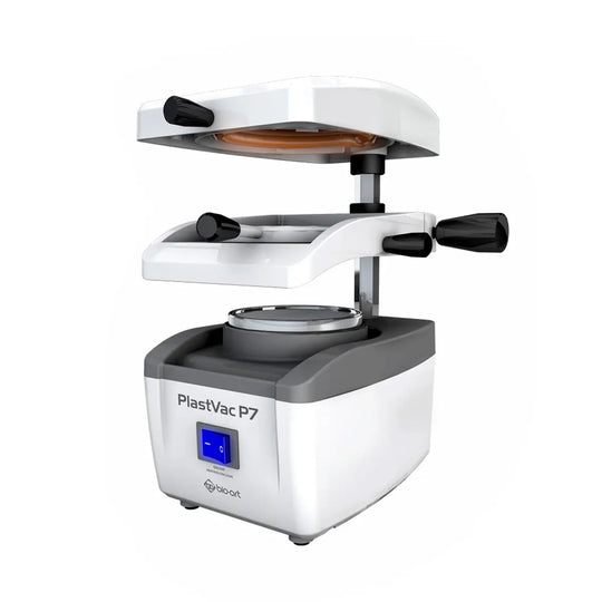 BIOART Dental Vacuum Forming Machine Laboratory Heat Molding Equipment PLASTVAC-P7, white and gray device with adjustable top plate, digital display, and rotary heating surface for dental thermoforming processes.