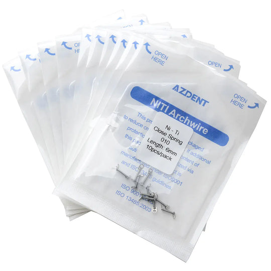 Multiple sealed packets of AZDENT NiTi Archwire dental orthodontic accessories, similar to Dental Orthodontic Accessory Closed Coil Spring 0.010 6mm 10pcs/Bag. White packaging with blue text and arrows, containing small metal orthodontic components visible through transparent window.