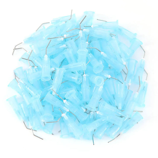 Pile of light blue dental pre-bent needle tips for 5 Bags Dental Pre Bent Needle Tips 9 Models 100pcs/Bag, showcasing various sizes and models for professional dental use