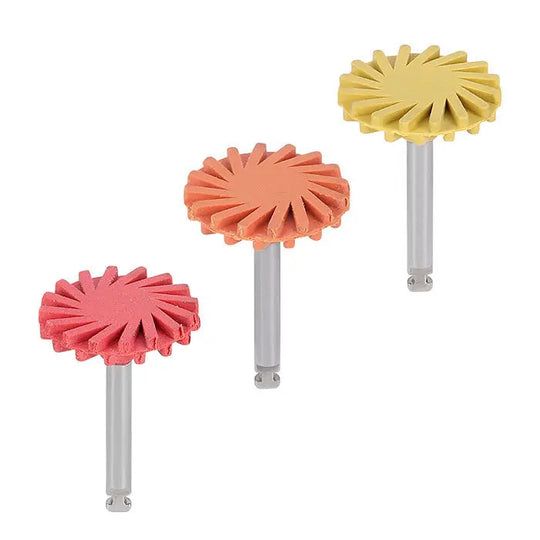 Dental Composite Polishing Wheel Rubber Polisher set in coarse, medium, and fine grits. Three sunburst-shaped polishers in red, orange, and yellow, mounted on metal shanks for dental rotary instruments. Used for polishing composite and ceramic restorations.