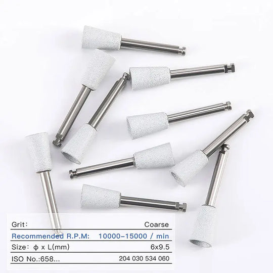 Dental Silicone Polishing Kit: Multiple white abrasive polishing tips with metal shanks for composite, natural teeth, and porcelain finishing. Various sizes and shapes visible, designed for dental use with contra angle handpiece.