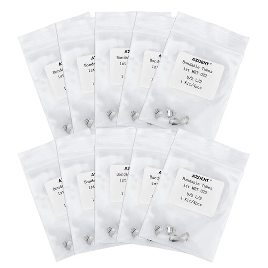 Multiple sealed packages of Bondable Tube 1st Molar Non-Convertible MBT 0.022 U2L2 4/Bag dental orthodontic tubes, displayed in rows, showing product details on each package and small metal components visible through transparent portions of the packaging.