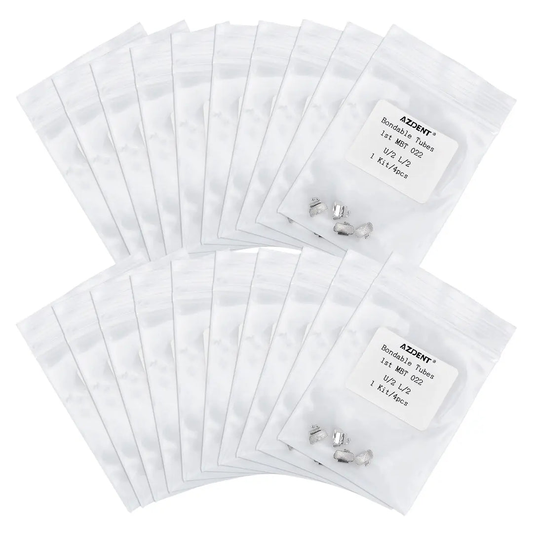 Multiple sealed packages of Bondable Tube 1st Molar Non-Convertible MBT 0.022 U2L2 4/Bag dental orthodontic products, arranged in rows, showing small silver components visible through transparent windows on white packaging.