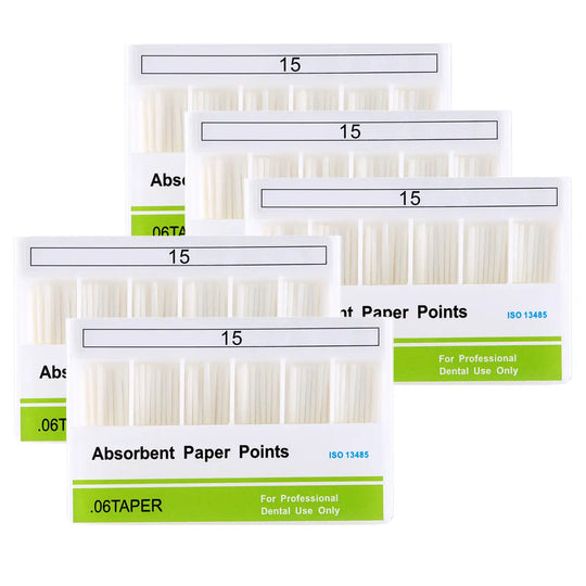 Multiple boxes of Absorbent Paper Points #15 Taper Size 0.06 100/Box for dental use, showing product packaging with white paper points visible through clear windows. Green labels indicate professional dental use and taper size.