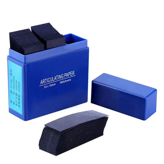 Dental Articulating Paper Strips 55*18mm 300pcs/Box in blue plastic container with open lid, showing stacks of dark blue paper strips used for checking dental occlusion and bite alignment