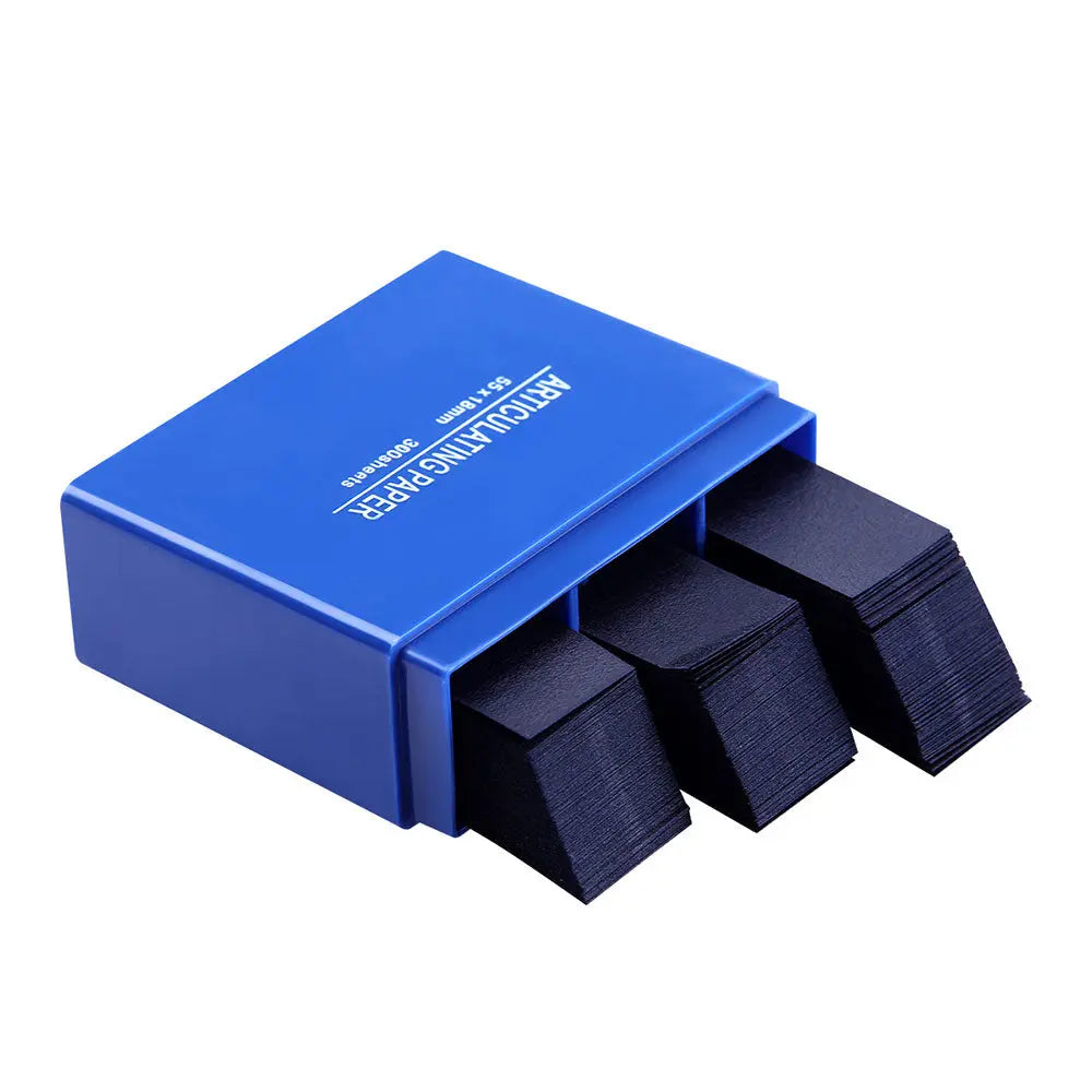 Dental Articulating Paper Strips 55*18mm 300pcs/Box: Blue plastic dispenser box containing black articulating paper strips for dental occlusion testing, showing three stacks of strips partially extended from the open box