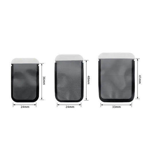 Three sizes of Dental X Ray Phosphor Plate Barrier Envelopes displayed side by side, showing dimensions for sizes #0, #1, and #2. Black opaque backs with white tops, illustrating the product's design for protecting dental x-ray sensors from contamination and light exposure.