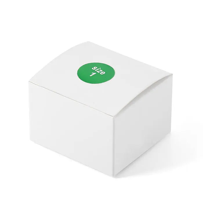 White box containing Dental X Ray Phosphor Plate Barrier Envelopes Size #0 #1 #2 100pcs/Box, with green circular label marked "Size 1" on top, representing protective packaging for dental imaging equipment