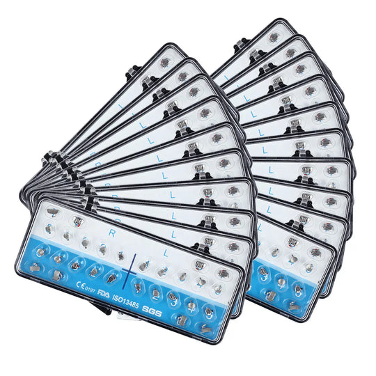 Dental Metal Lingual Bracket Braces with Buccal Tube 24pcs Brackets+4pcs Buccal Tubes/Box, arranged in a fan-like pattern. Multiple white and blue orthodontic bracket sets displayed, showing various sizes and configurations for dental procedures.