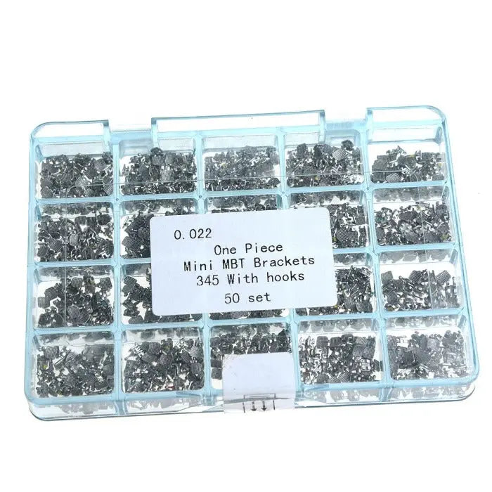 Clear plastic organizer box containing 1000pcs Dental Metal Brackets Mini MBT .022 Hooks on 345, sorted into compartments. Label shows product details. Dental orthodontic supplies for professional use.