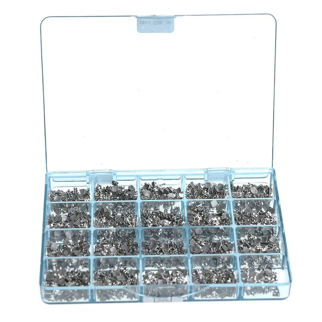 1000pcs Dental Metal Brackets Mini MBT .022 Hooks on 345 50 Sets/Box in clear plastic organizer case with multiple compartments filled with small silver metal orthodontic brackets