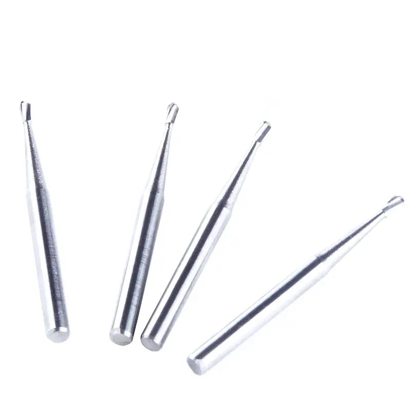 Dental Carbide Bur FG #330 Pear Shaped 10pcs/Box: Close-up of four silver tungsten steel dental burs with pear-shaped tips, showcasing their sharp cutting edges and high-speed design for dental handpieces