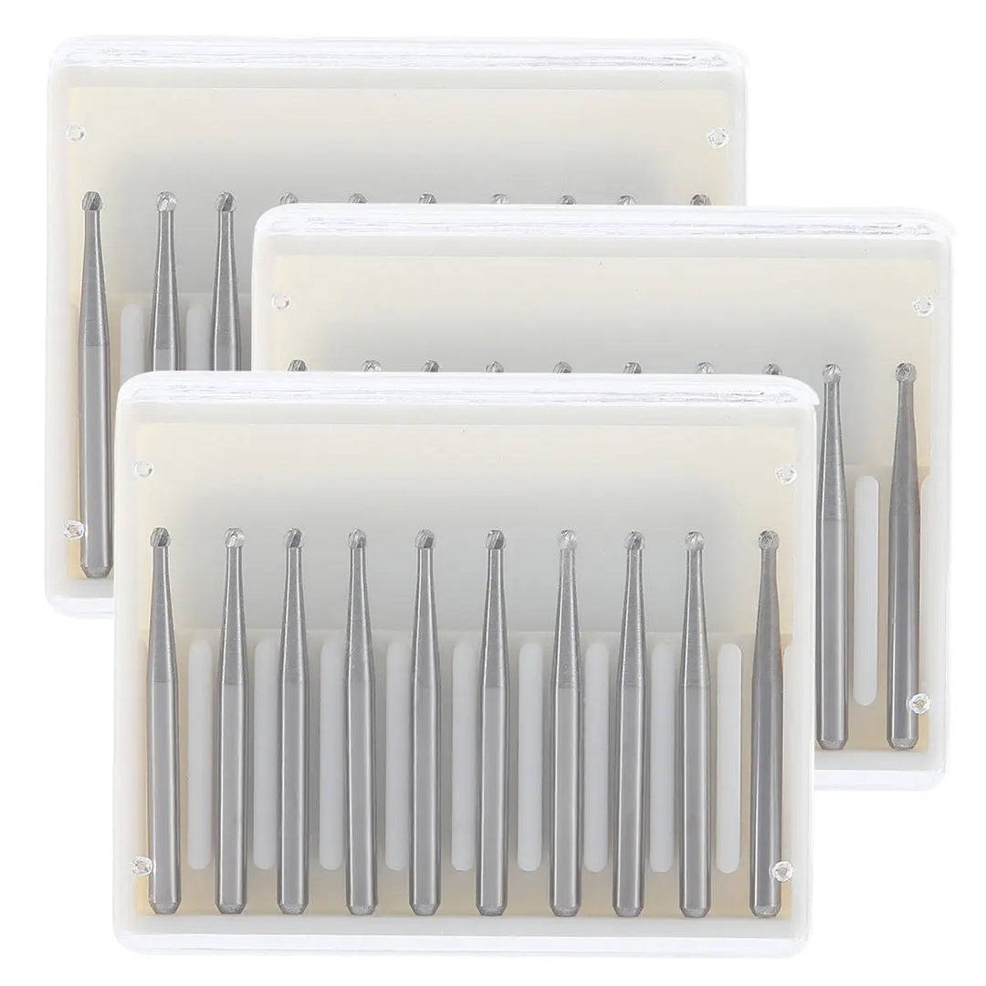 Dental FG #2 Round Carbide Bur 10pcs/Box: Three clear plastic cases containing multiple silver dental burs arranged neatly in rows. Tungsten carbide tools for high-speed dental handpieces, showcasing durable and efficient cutting instruments for professional dental procedures.