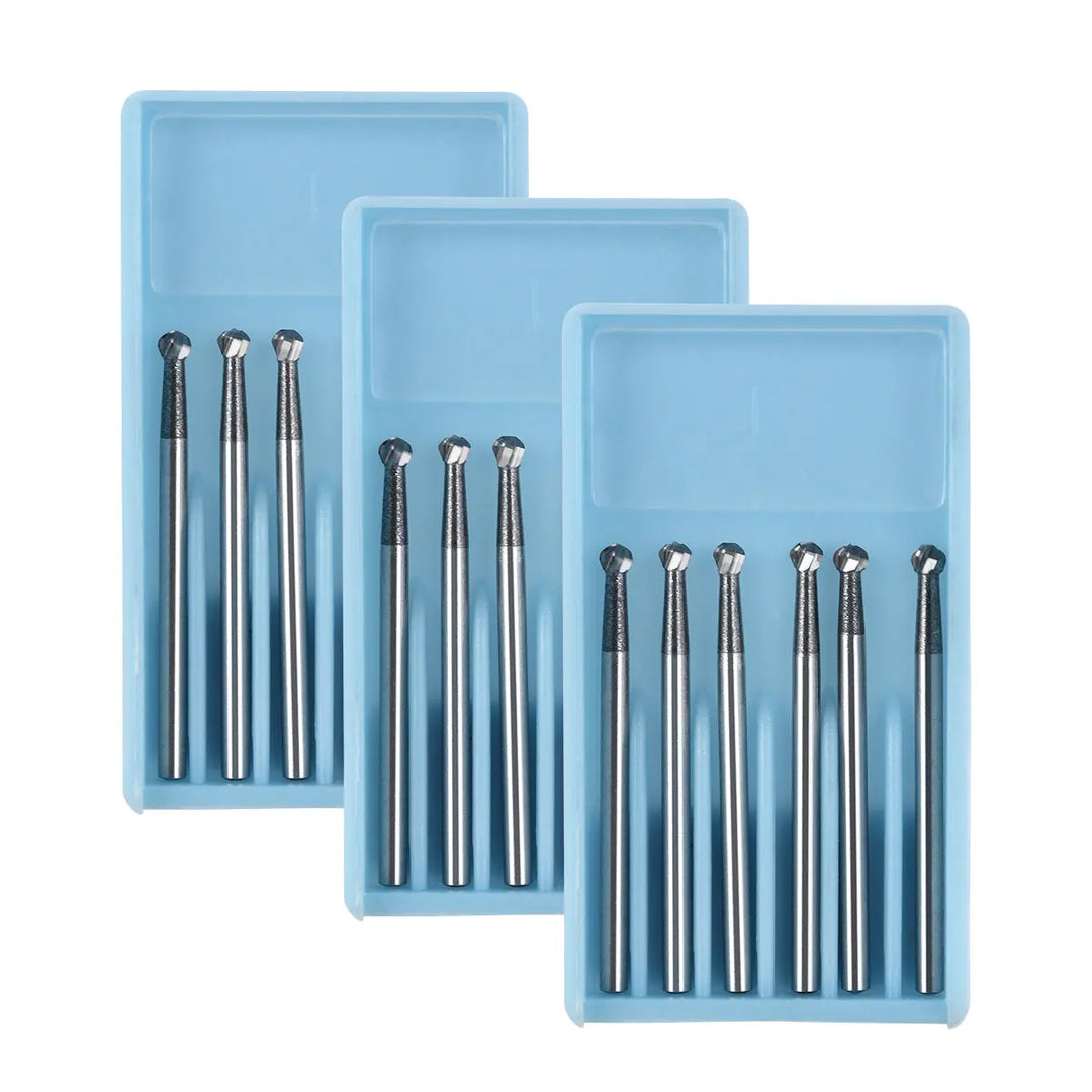 Dental FG #6 SL Surgical Length Round 25mm Carbide Burs in blue plastic trays, 6pcs/Box. Three trays containing silver metallic dental burs with round heads, arranged neatly in rows. High-speed handpiece tools for smooth, powerful cutting in dentistry.