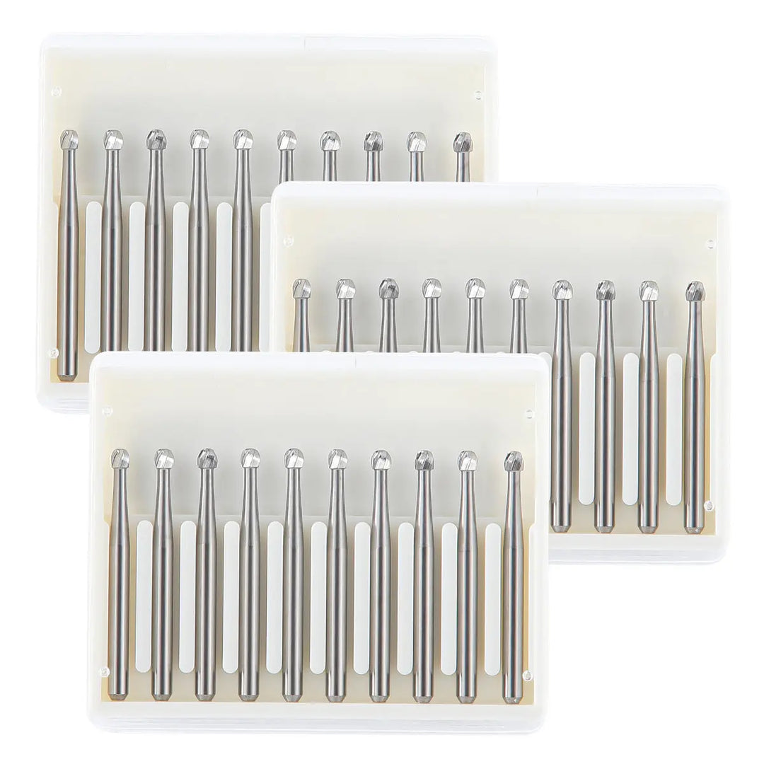 Dental FG #5 Round Carbide Bur 10pcs/Box: Three transparent plastic cases containing multiple silver-colored dental burs with round tips, designed for high-speed handpieces, offering smooth cutting and durability for dental procedures.