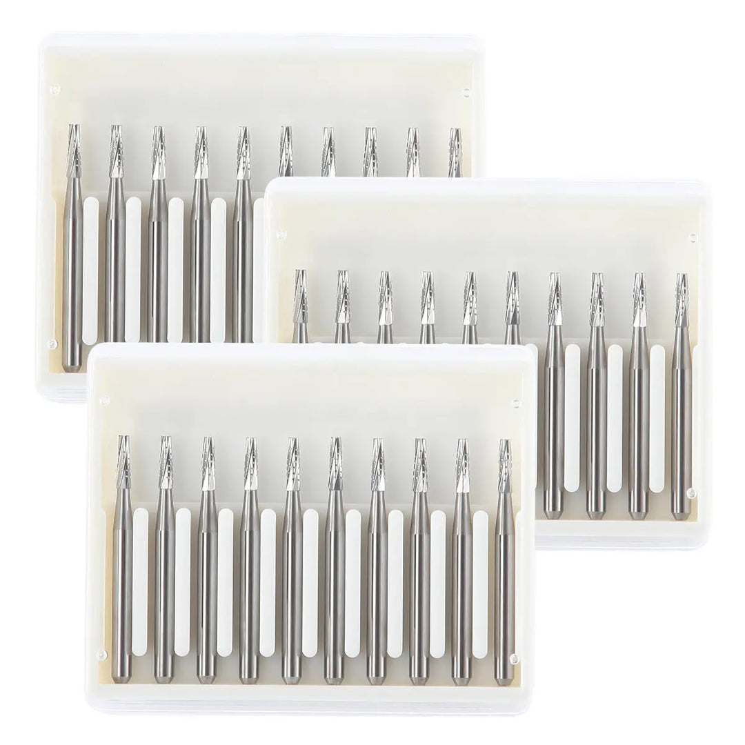 Dental Carbide Bur FG #701 Flat End Taper Fissure Crosscut 10pcs/Box: Three boxes of silver dental burs with tapered ends, arranged neatly in rows. Each box contains 10 precision-made tungsten carbide burs for high-speed dental handpieces, showcasing their durable and efficient cutting design.