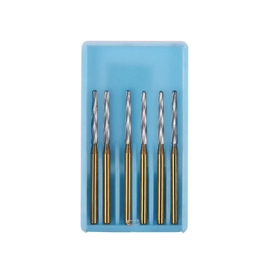 Dental FG Carbide Finishing Burs 28mm Gold 6pcs/Box displayed in a light blue plastic case. Six gold-colored dental burs with silver cutting tips arranged neatly in a row, showcasing their precision design for dental procedures and tooth preparation.