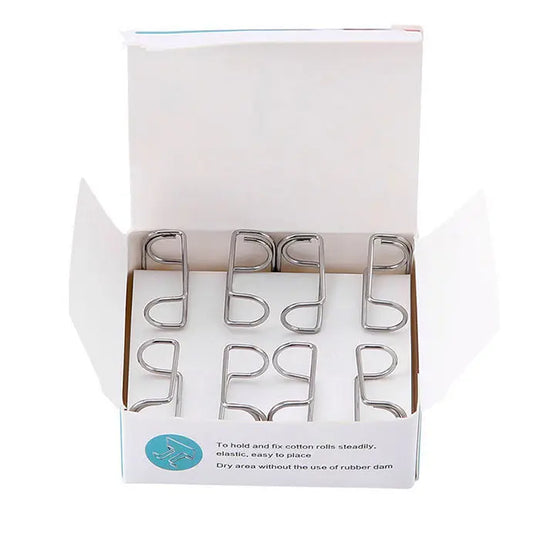 Dental Cotton Roll Holder Stainless Steel Clip Autoclavable 4pcs/Box displayed in open white packaging, showing eight silver metal clips arranged neatly inside. Product box features blue text and icon, emphasizing dental use and ease of placement.