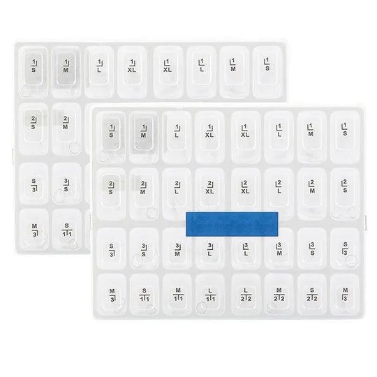 Dental Anterior Transparent Crowns for Aldult № 1.910 64Pcs/Box displayed in organized clear plastic trays. Multiple compartments labeled with sizes and numbers for different tooth positions. Blue label visible on one compartment for easy identification.