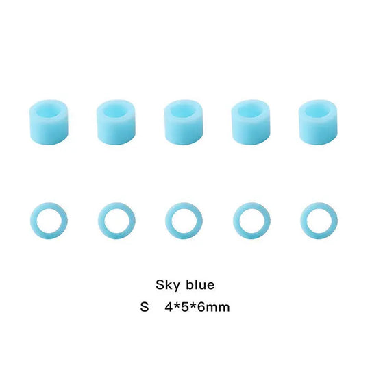 Dental Color Code Rings Universal Silicone Autoclavable 10 Colors 100pcs/Box: Sky blue silicone rings in two sizes, cylindrical and circular, for dental instrument identification. Small 4x5x6mm rings displayed in rows, showcasing their uniform shape and color.