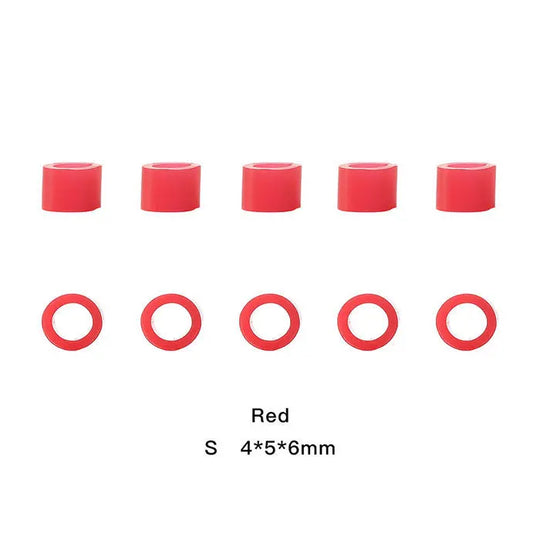 Dental Color Code Rings Universal Silicone Autoclavable 10 Colors 100pcs/Box: Red silicone rings in two sizes, cylindrical and circular, for dental instrument identification. Displayed on white background, showing durability and versatility for dental practice organization and sterilization.