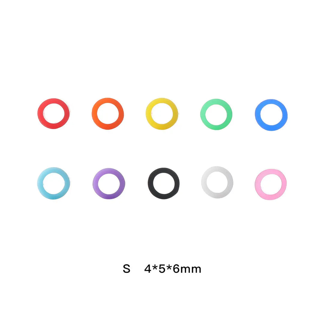 Dental Color Code Rings Universal Silicone Autoclavable 10 Colors 100pcs/Box: Set of small, colorful silicone rings in 10 different colors arranged in two rows. Each ring measures 4x5x6mm, ideal for dental instrument identification and organization.