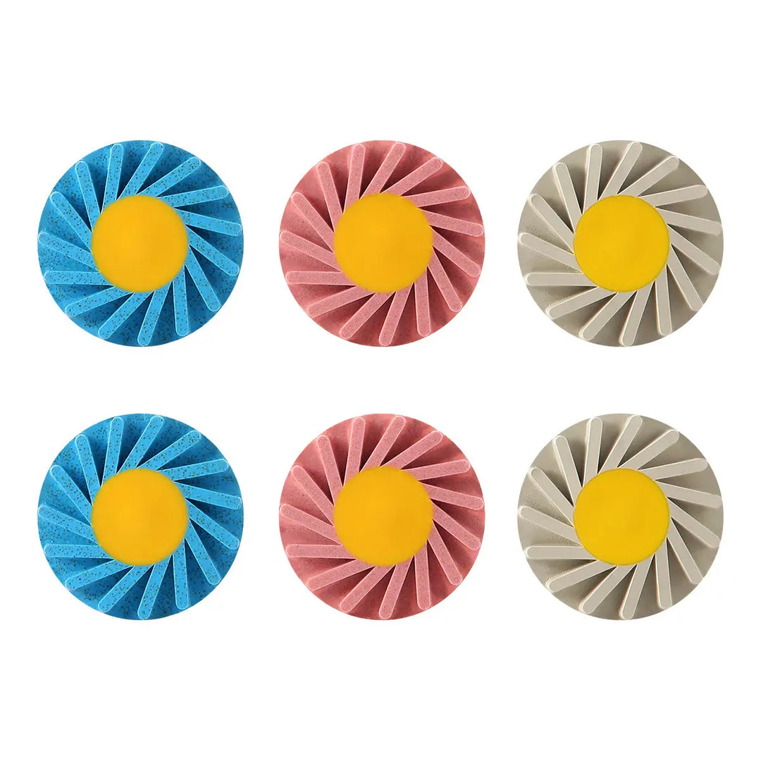 Dental Zirconia Polishing Wheel 3-Step Polishing System: Six circular polishing wheels arranged in two rows, featuring blue, pink, and gray colors with yellow centers. Each wheel has a radial pattern for smoothing, pre-polishing, and high-shine polishing of dental materials.