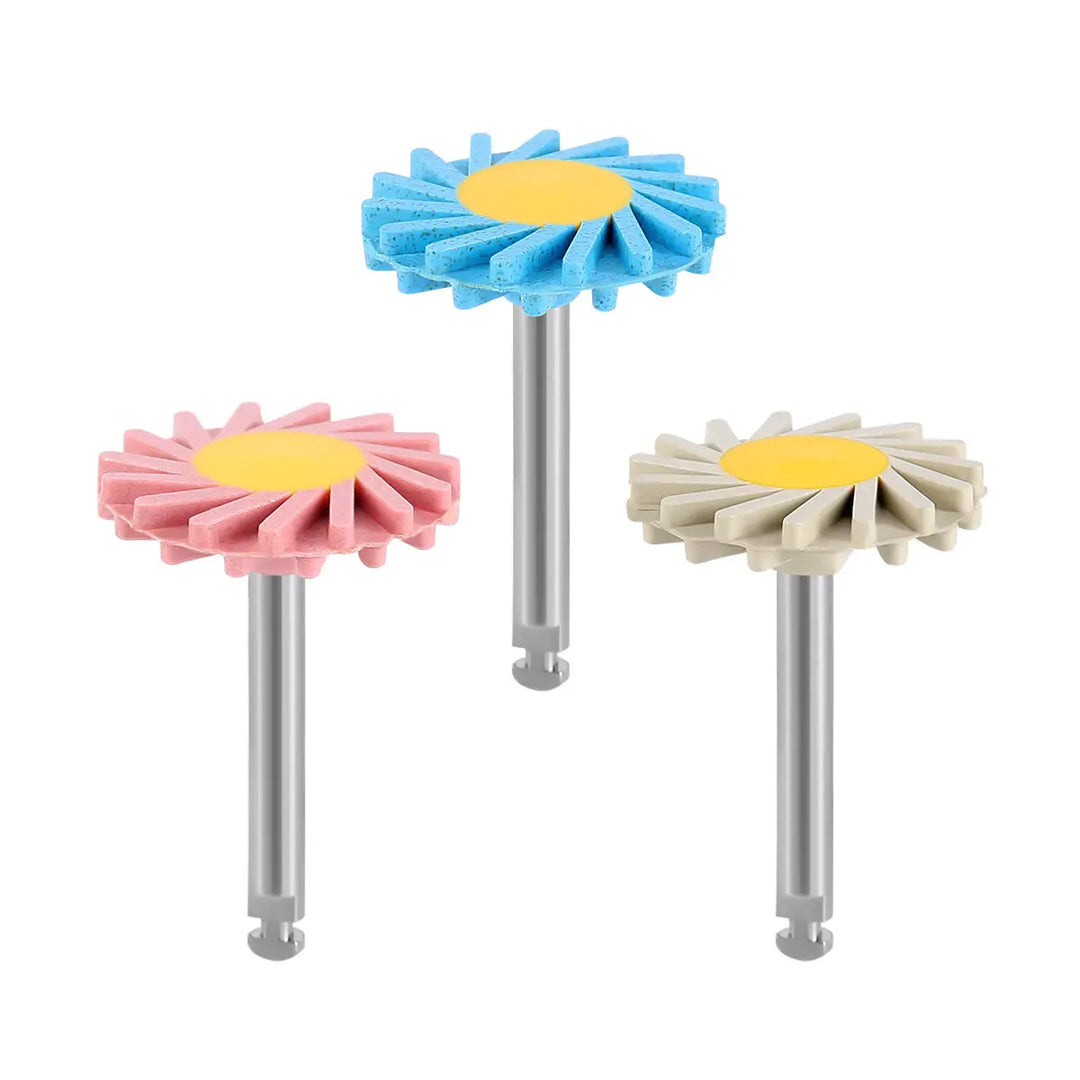 Three dental zirconia polishing wheels in blue, pink, and beige colors with yellow centers, mounted on metal shafts. Part of the 3-Step Polishing System for Contra Angle Handpiece, designed for smoothing, pre-polishing, and high-shine polishing of dental materials.