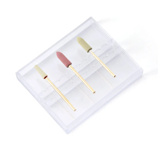 Dental Zirconia Grinding and Polishing Kit featuring three ceramic rubber diamond polishers with HP 2.35mm shanks in a clear plastic case. Tools have gold-colored handles and white, pink, and beige polishing tips for efficient zirconia restoration and glazing.