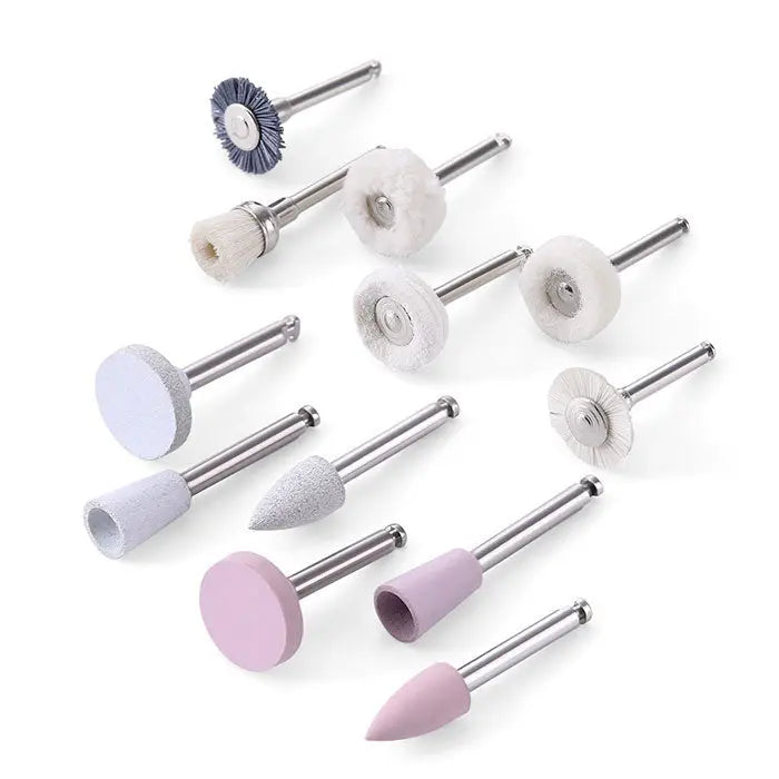 Dental Composite Polishing Kit For Composite Finishing and Polishing 12pcs/Box featuring various polishing tools including brushes, discs, and points in white, pink, and blue colors. Assorted shapes and sizes for different dental polishing needs, all with metal shanks for attachment to dental handpieces.