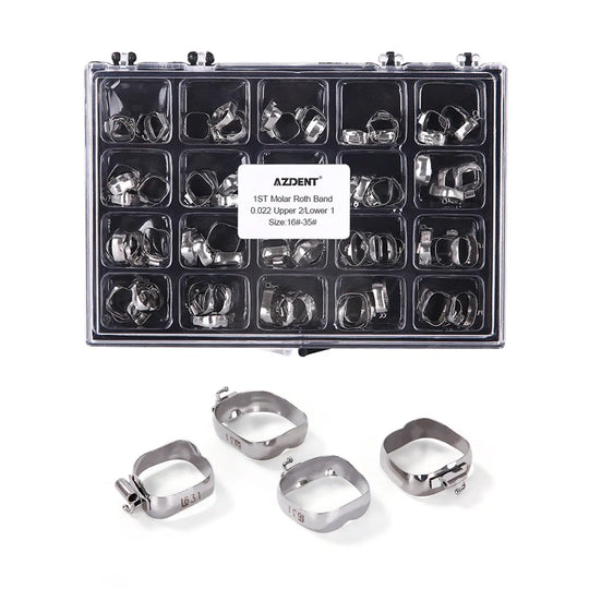 1st Molar Bands with Buccal Tube Roth .022 #16-#35 U2/L1 80pcs/Box. Clear plastic case containing multiple compartments filled with stainless steel orthodontic molar bands. Four larger bands displayed in front, showcasing different sizes and shapes for various dental applications.