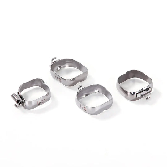 Stainless steel 1st Molar Bands with Buccal Tube Roth .022 for orthodontic use, shown as four individual bands with size markings, featuring a sleek silver finish and sturdy construction for dental applications