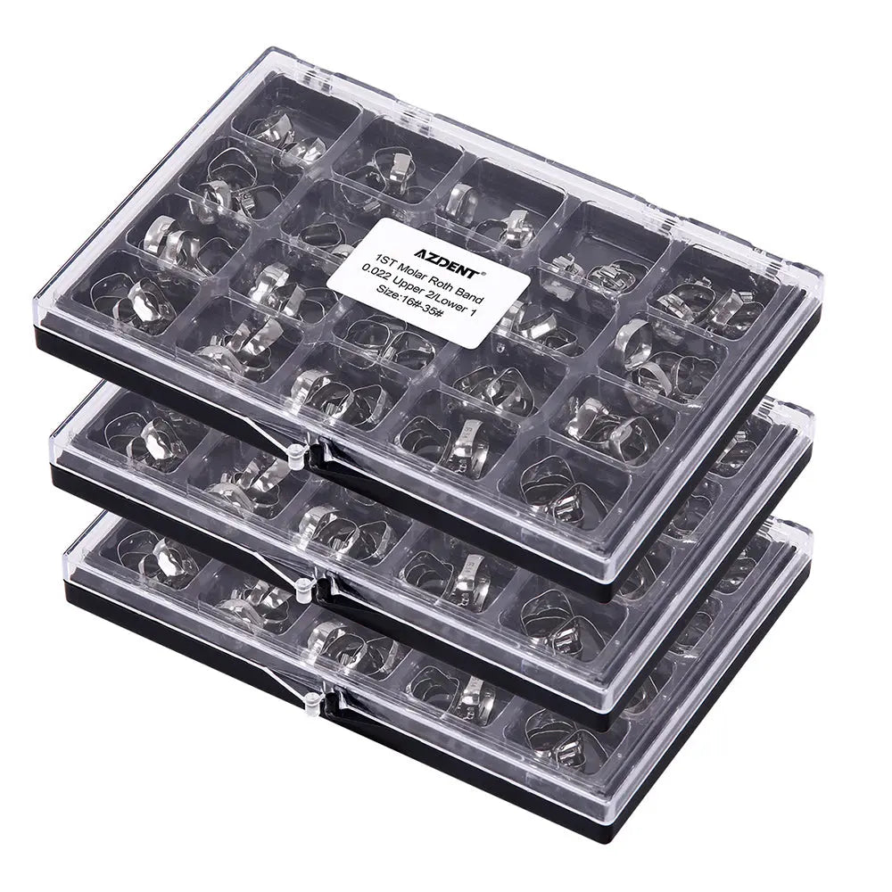 1st Molar Bands with Buccal Tube Roth .022 #16-#35 U2/L1 80pcs/Box: Three stacked transparent plastic cases containing organized orthodontic molar bands and buccal tubes. Each case has multiple compartments filled with small metallic dental components, showcasing the product's variety and quantity.