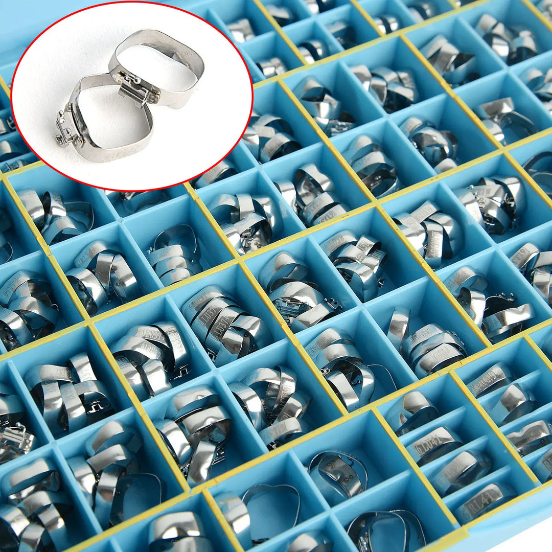 Dental Buccal Tubes Band Roth .022 1st Molar Single Welded & Conv 85sets/Box displayed in blue compartmentalized tray with closeup of individual stainless steel bands in corner inset