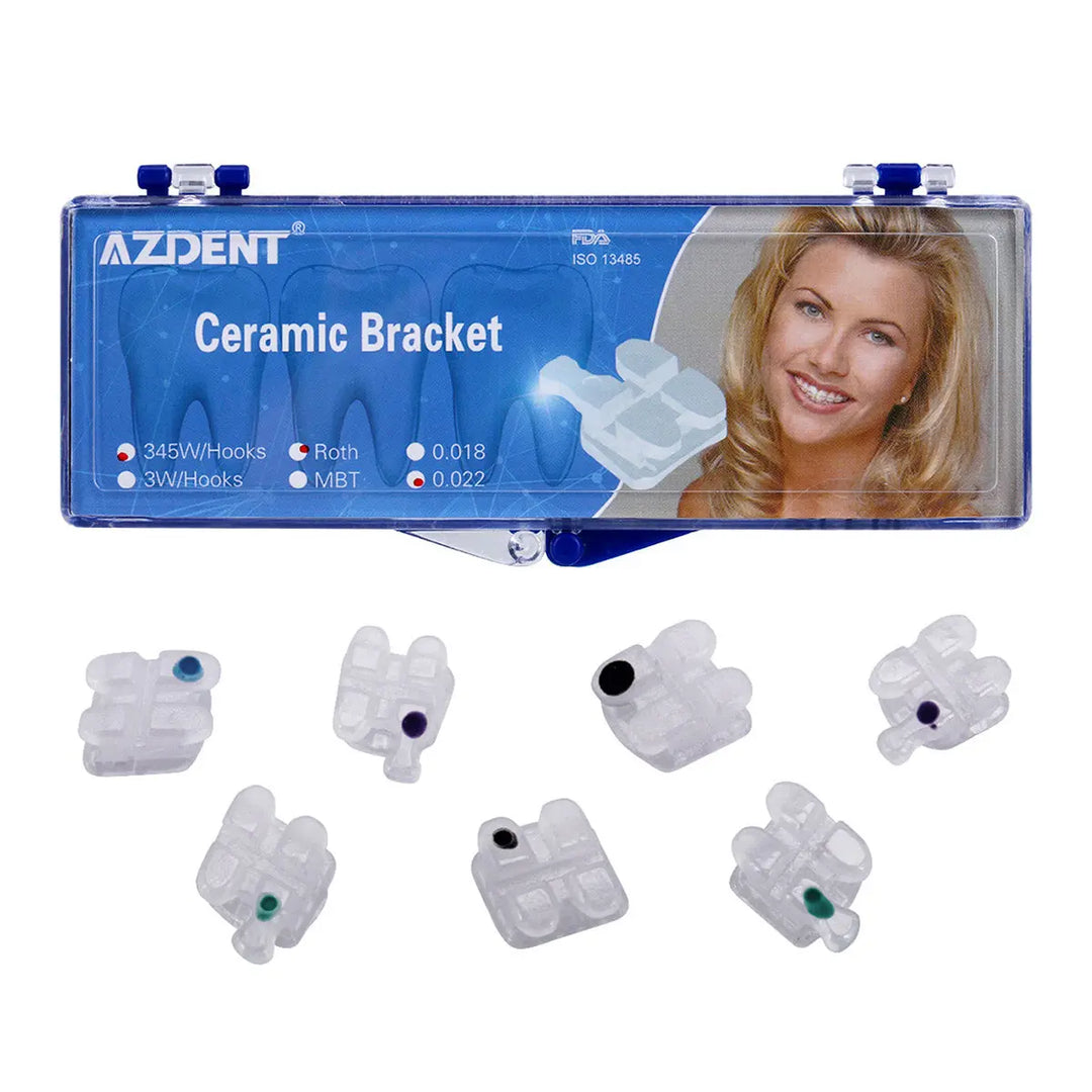 Dental Orthodontic Ceramic Brackets Mesh Base Full Size 20pcs/Box displayed in blue plastic case with product details. Set of white ceramic brackets with color-coded dots shown below. Ideal for orthodontic treatments, offering precise alignment and comfort.