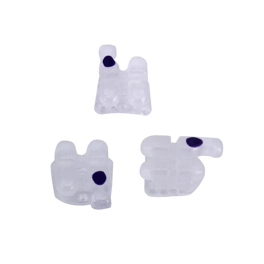 Ceramic Brackets Roth .018 Mesh Base 345/Hooks 20/Box: Three white orthodontic brackets with mesh bases and dark blue marks, showcasing their low-profile design and special base structure for strength and aesthetics in dental alignment.