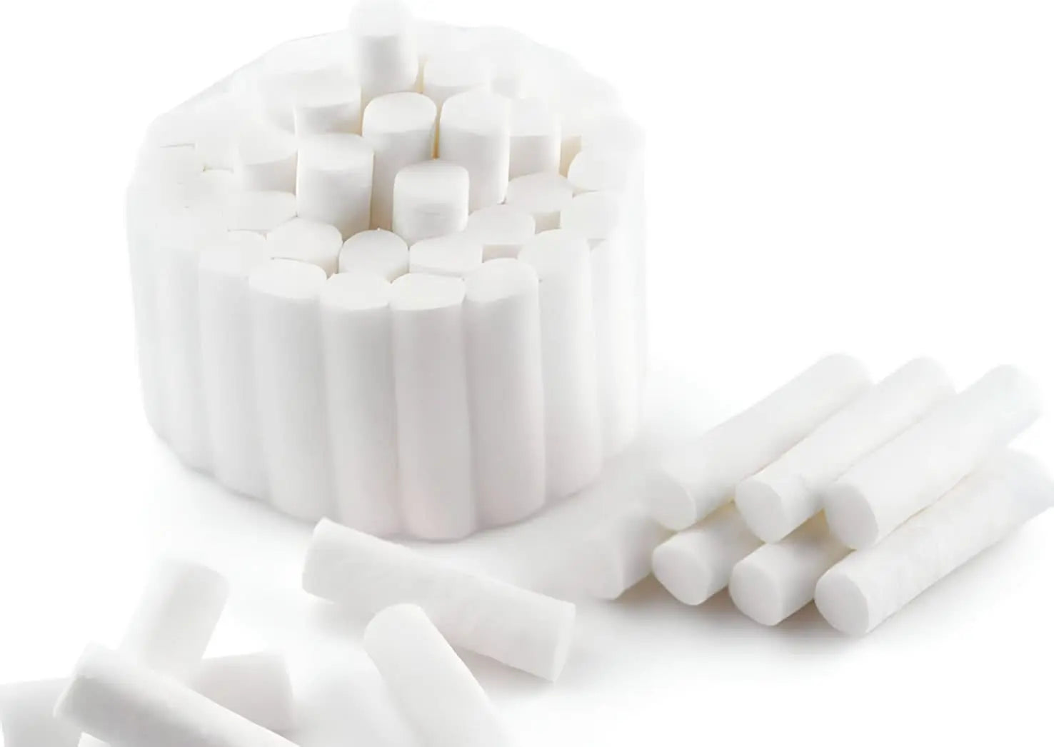 Cotton Rolls Size 2 displayed in a bundle with individual rolls stacked vertically and horizontally. White, cylindrical cotton rolls arranged neatly, showcasing the product's shape and texture. Ideal for dental or medical use, demonstrating the quantity and quality of the 3000-roll package.