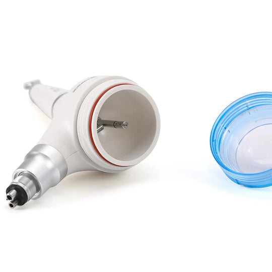 Dental Air Polisher Prophy Teeth Whitening A1 Detachable 360° Rotating Handpiece 4 Holes with white ergonomic body, metal nozzle, and transparent powder chamber shown next to blue lid