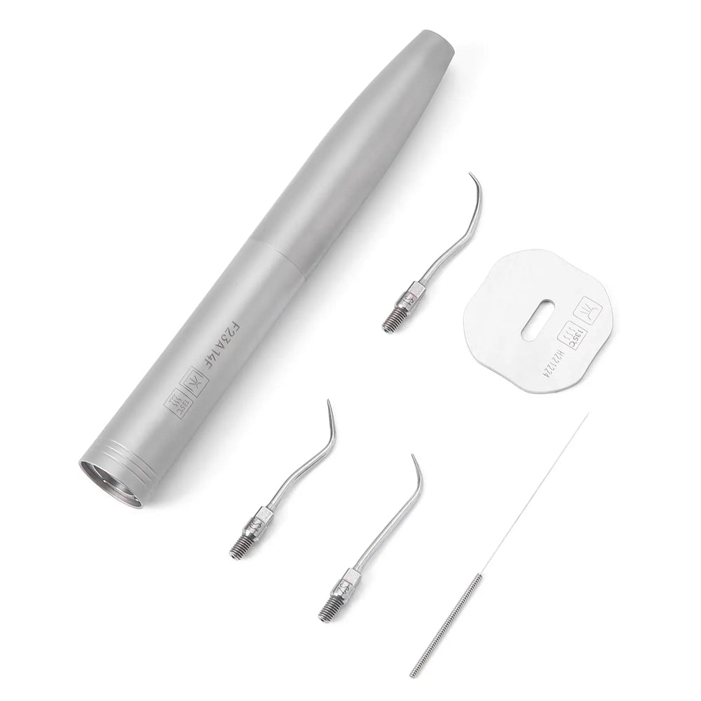 Dental Air Scaler Handpiece Sonic S with silver body, three interchangeable metal tips, torque wrench, and instruction manual displayed on white background