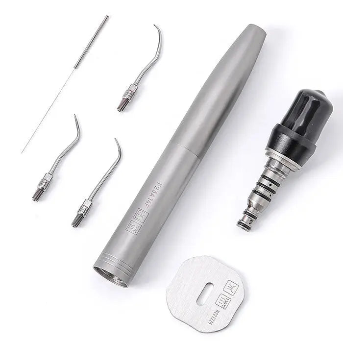 Dental Air Scaler Handpiece Sonic S with 4 Hole Quick Coupling set, including silver handpiece, multiple scaler tips, coupling, and torque wrench on white background. Professional dental tool for efficient cleaning and scaling procedures.