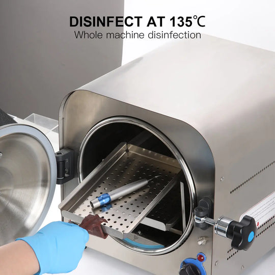 Dental Air Scaler Handpiece disinfection process in sterilization machine at 135°C. Gloved hand placing handpiece in open sterilizer chamber, demonstrating whole machine disinfection for dental equipment safety and hygiene.