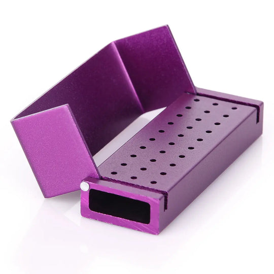 Purple dental burs drill disinfection block with 30 holes for high-speed handpiece holders. Aluminum construction, autoclavable, compact size for efficient sterilization of dental burs. Dental Burs Drill Disinfection Block High Speed Handpiece Holder.