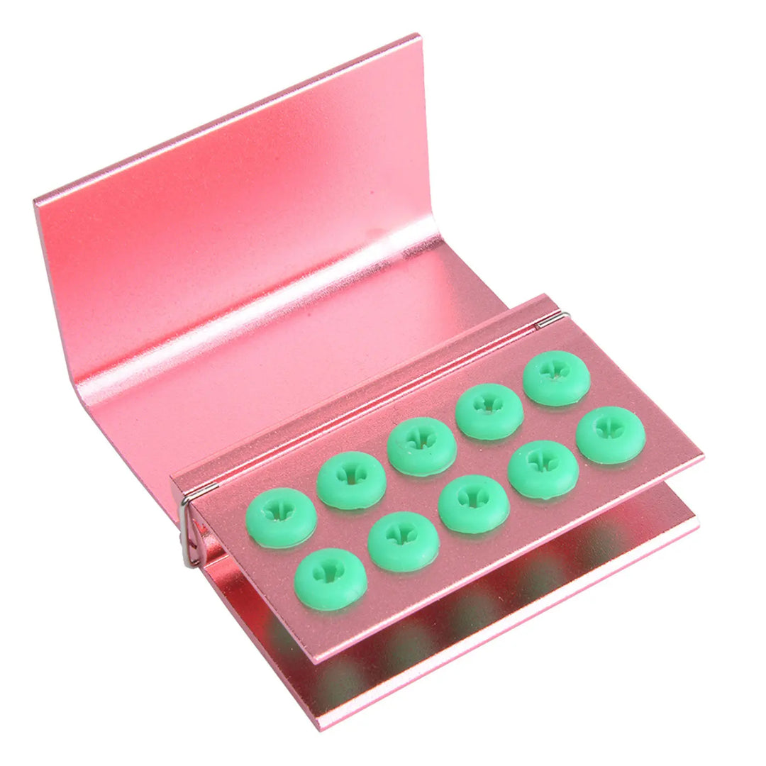 Dental Burs Holder Block 10 Holes with Silicon Cover FG RA Autoclavable featuring pink aluminum case with green silicon inserts for 10 dental burs, open lid displaying organized storage for dental instruments