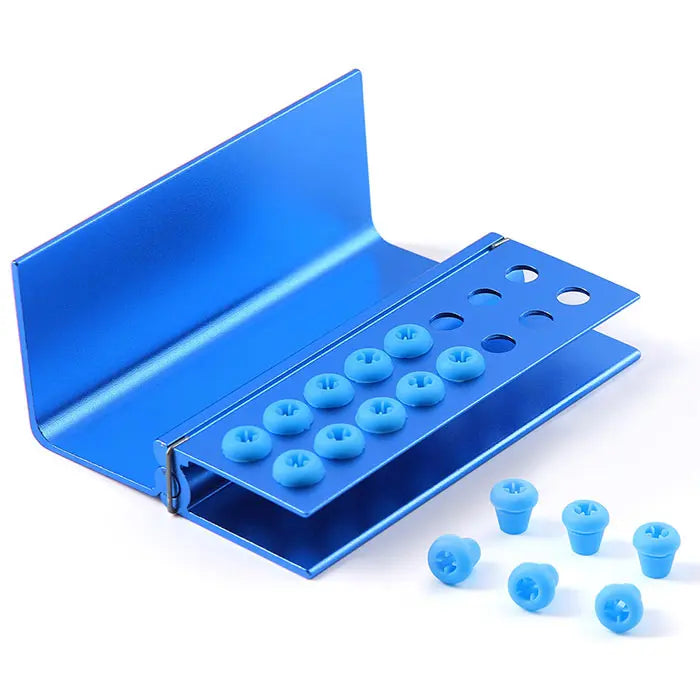 Dental Burs Holder Block 16 Holes with Silicon Cover FG RA Autoclavable: Blue aluminum dental bur block with 16 holes and removable blue silicon covers, designed for organizing and sterilizing high and low speed dental burs, featuring an autoclavable metal construction for hygienic dental procedures